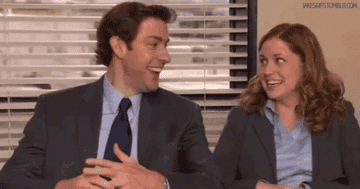 Jim and Pam laughing in their confessional