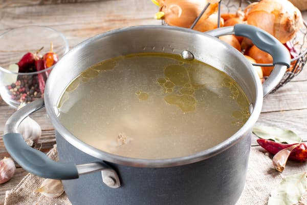 Chicken broth in a sauce pan