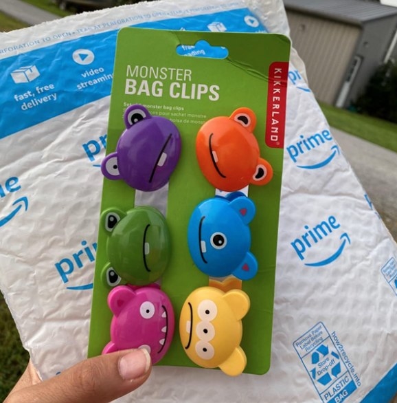 reviewer photo showing the monster clips in their packaging