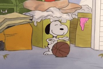 An animated gif of Snoopy dribbling and making a shot into the basketball hoop