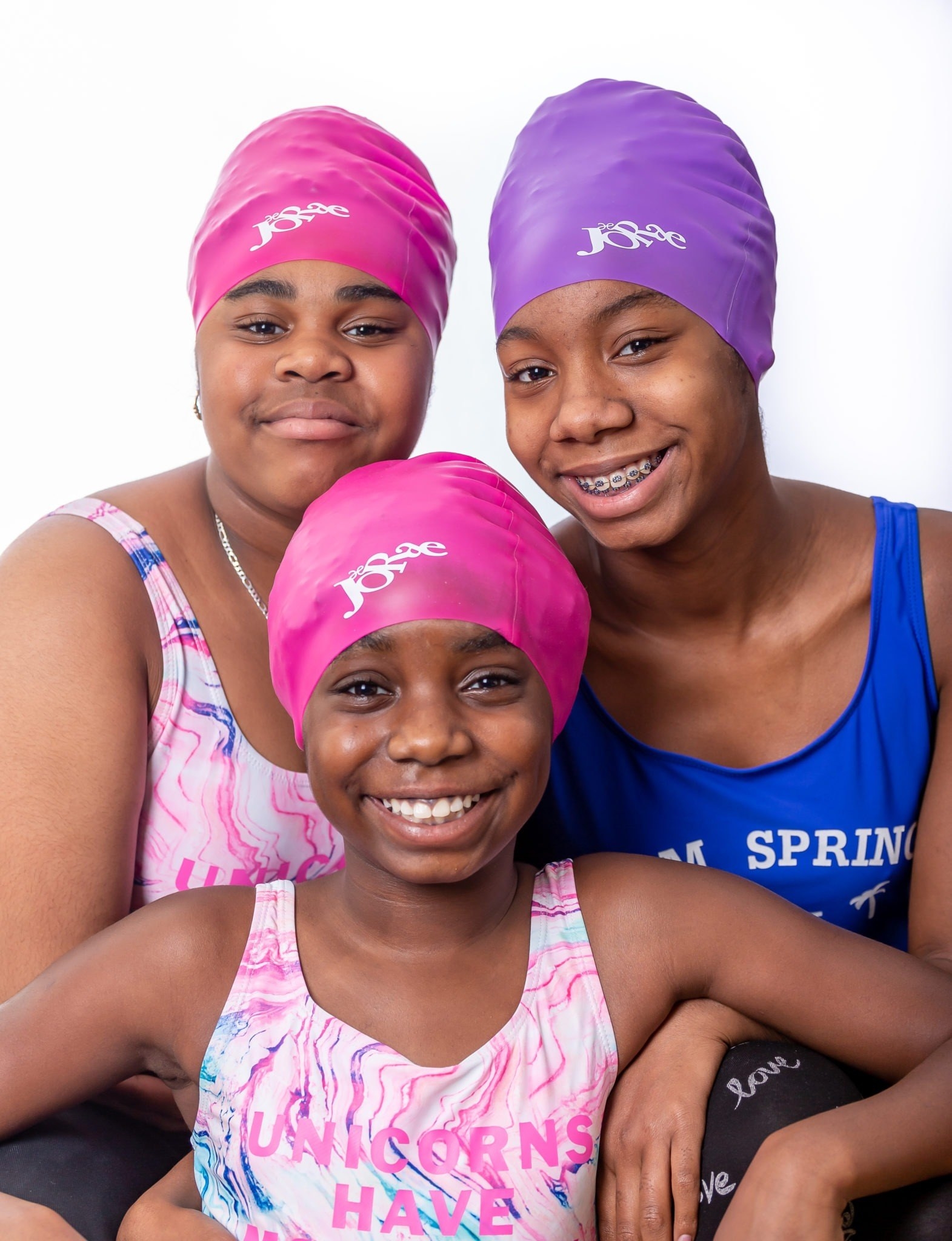 Children modelling the Jorae Swimming Hats