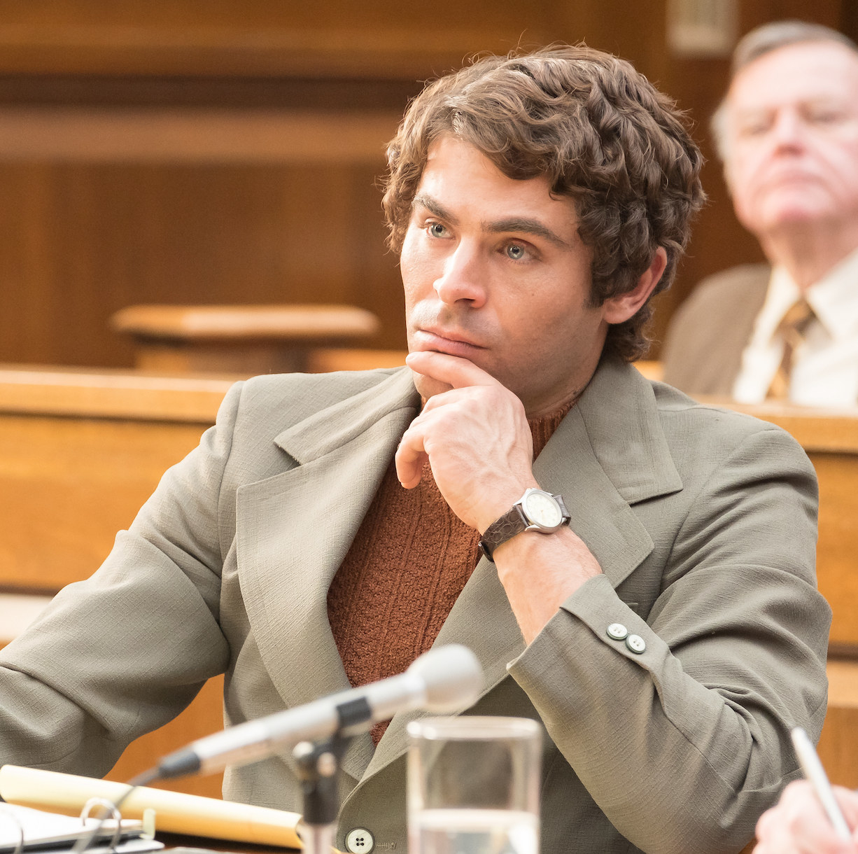 Zac wearing a very similar suit for the trial scene