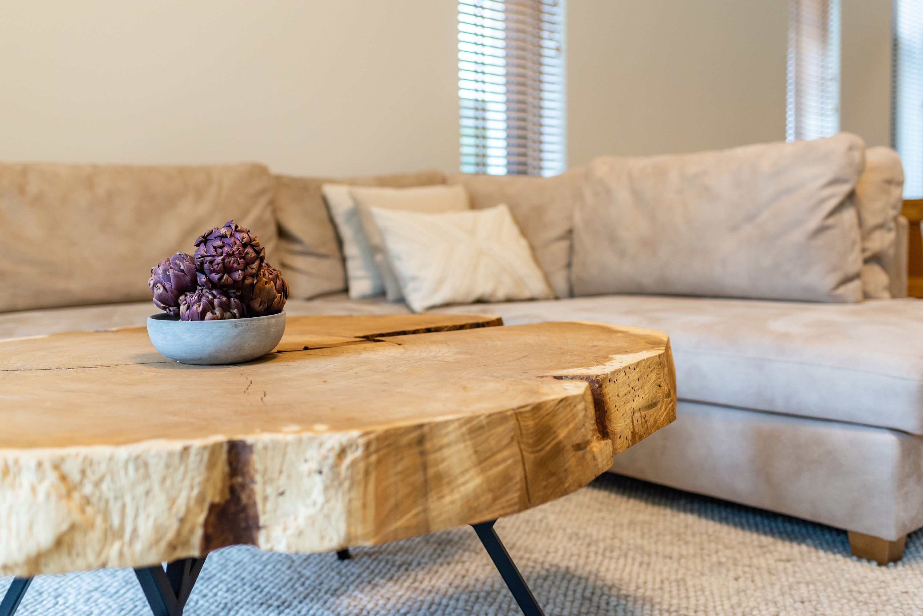 a raw edge wooden coffee table