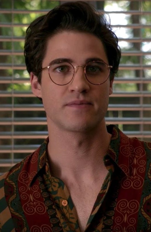 close up of Darren wearing the same style of glasses and short hair