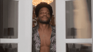Man opens doors to the outside