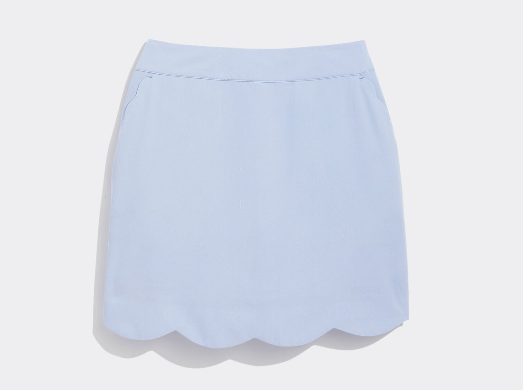 This skort with a scalloped hemline in a light blue color