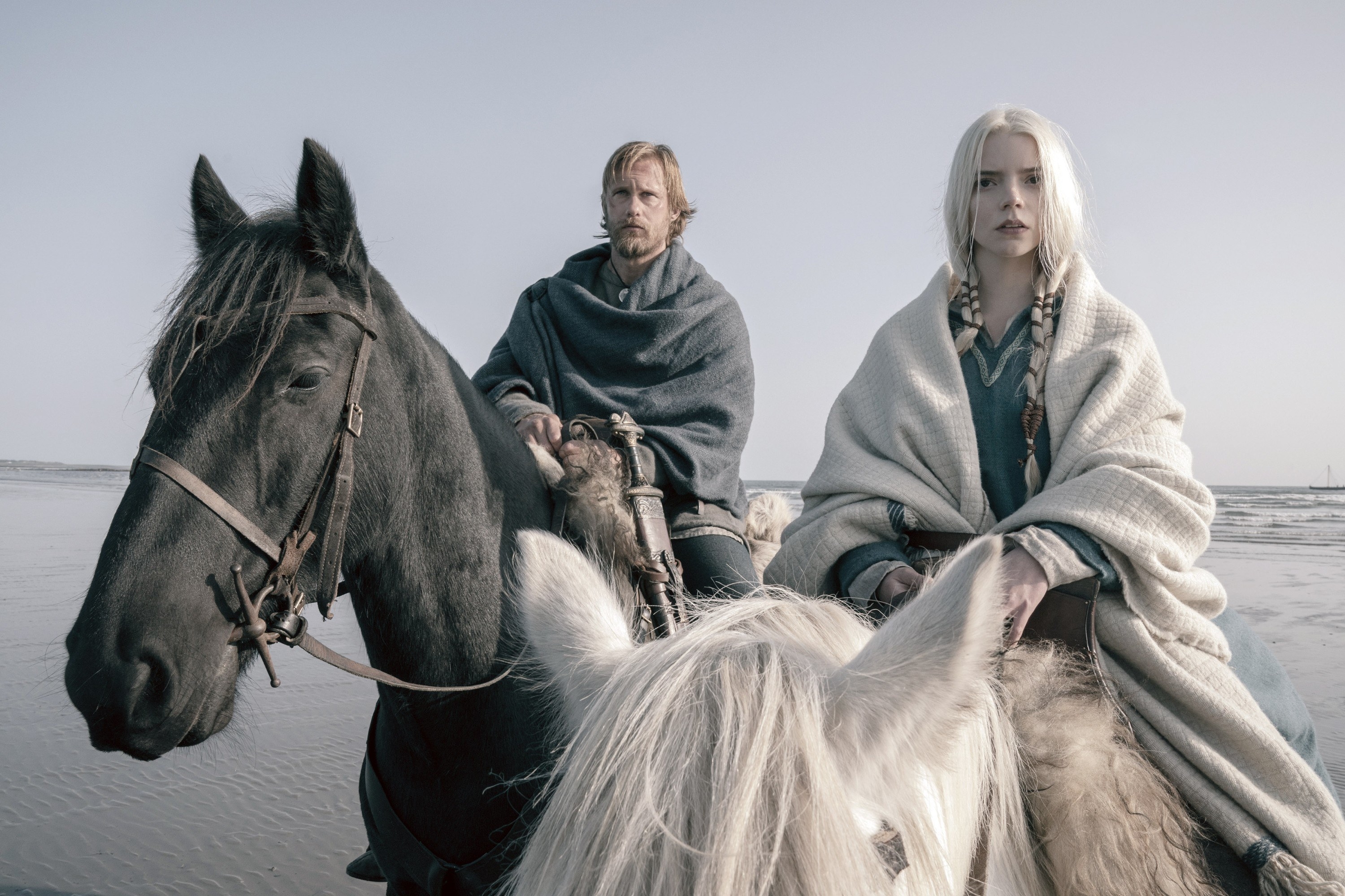 Alexander Skarsgard and Anya Taylor-Joy ride on horses