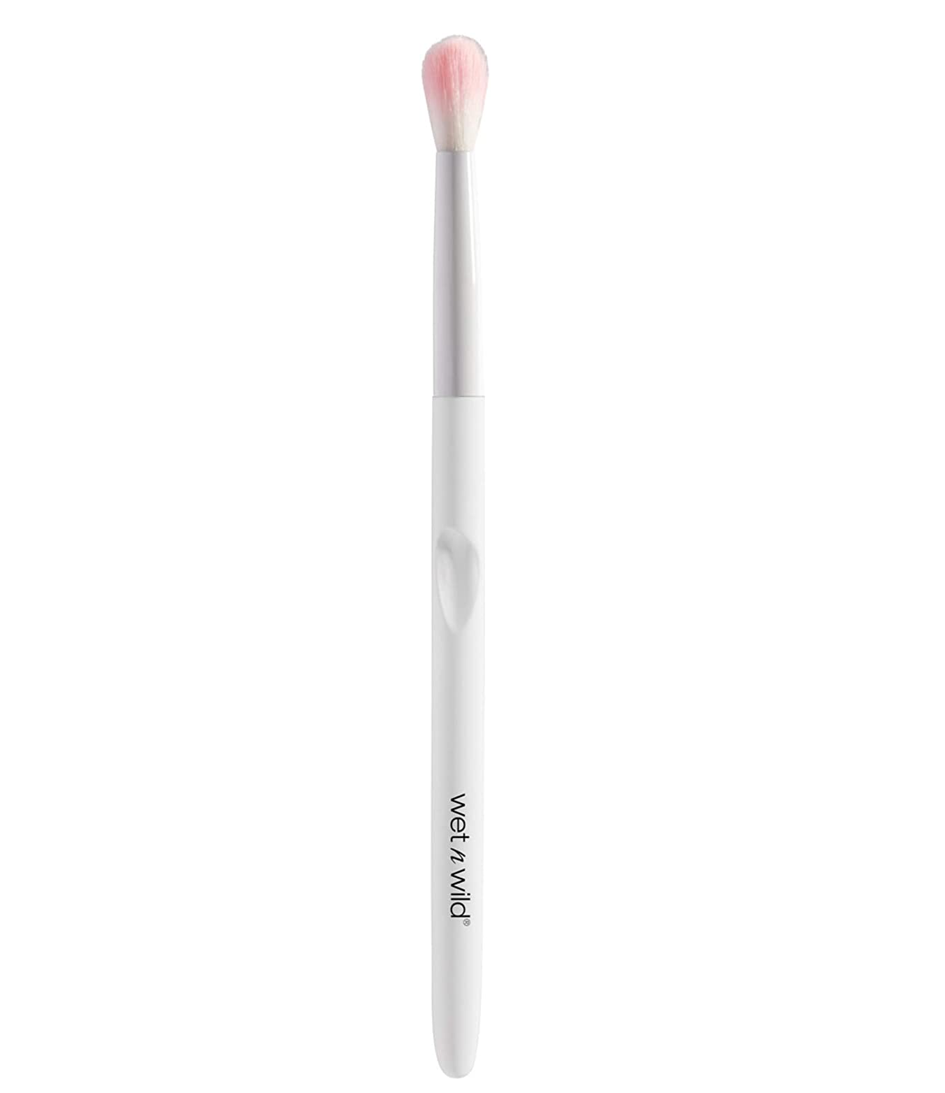 A small makeup brush on a plain background