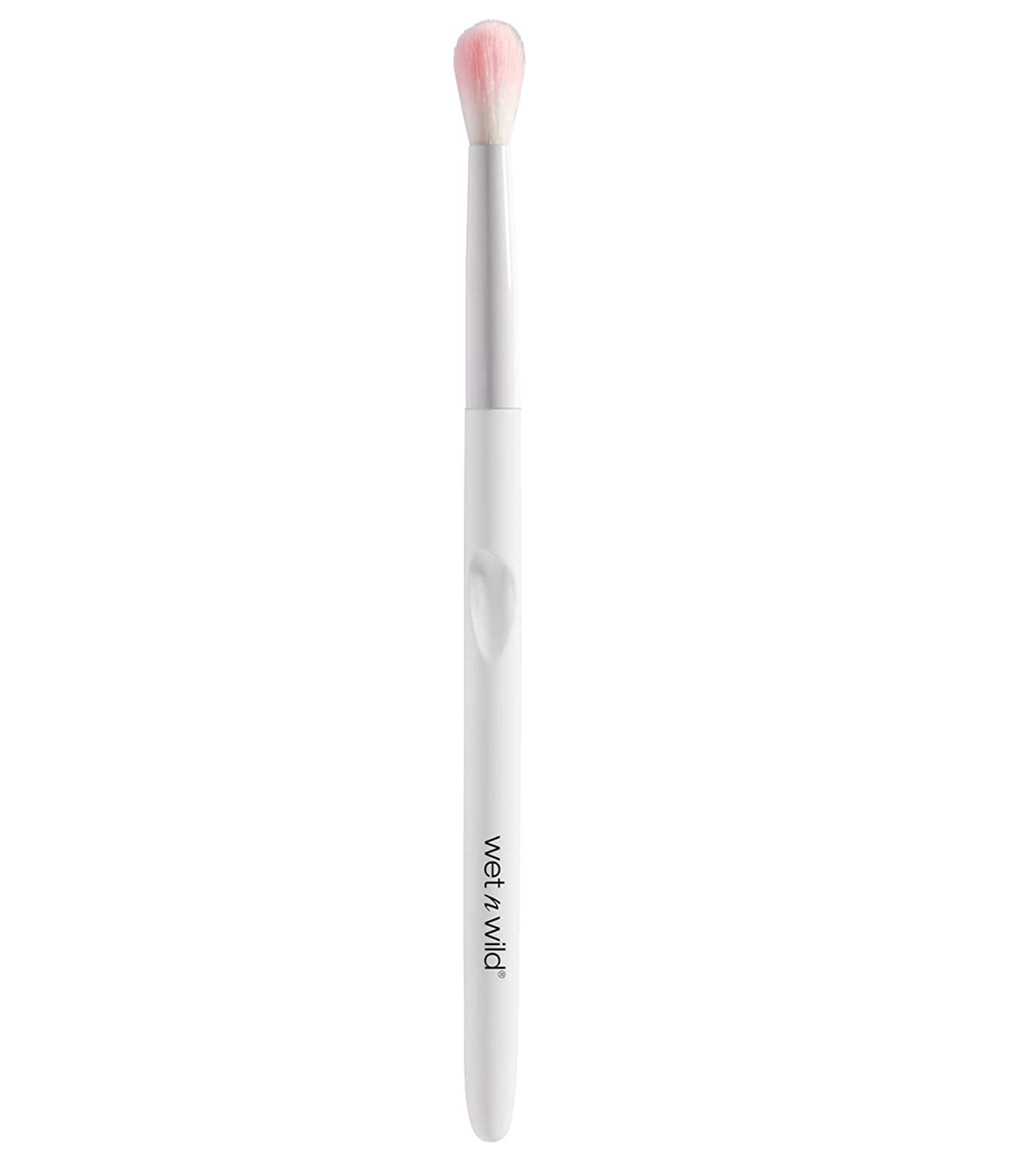 A small makeup brush on a plain background