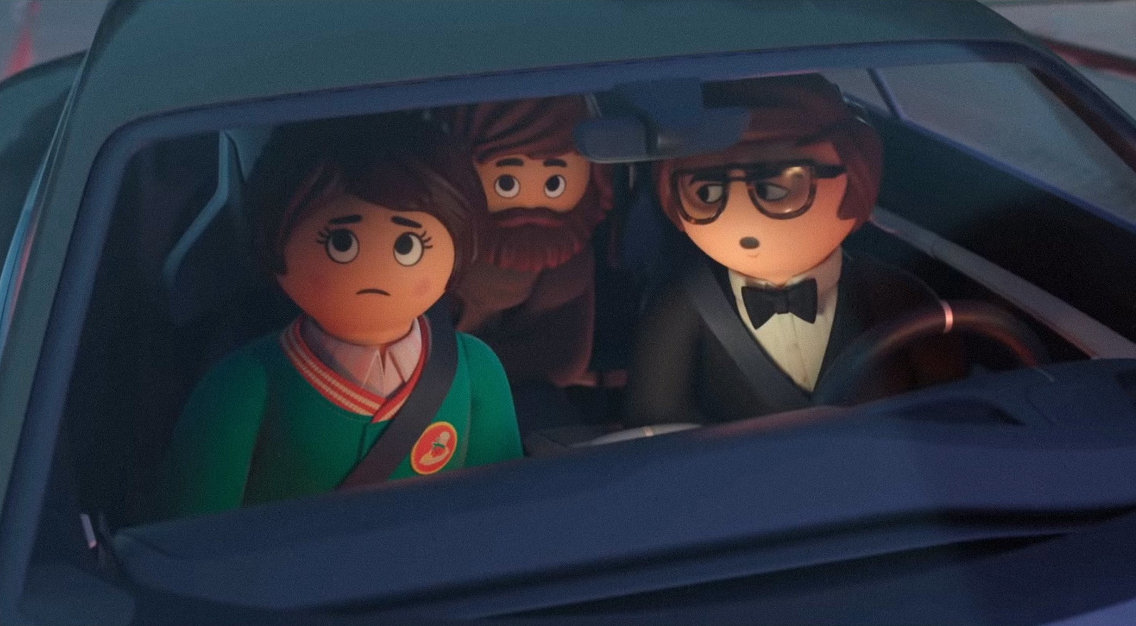 Marla, Del, and Rex drive in a car