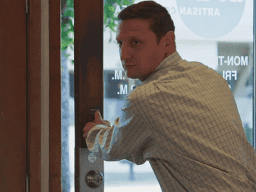 Tim Robinson force pulls a push door in &quot;I Think You Should Leave&quot;