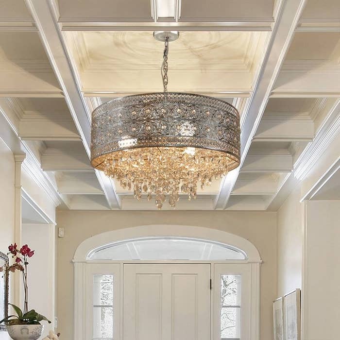 the crystal chandelier hanging in a home