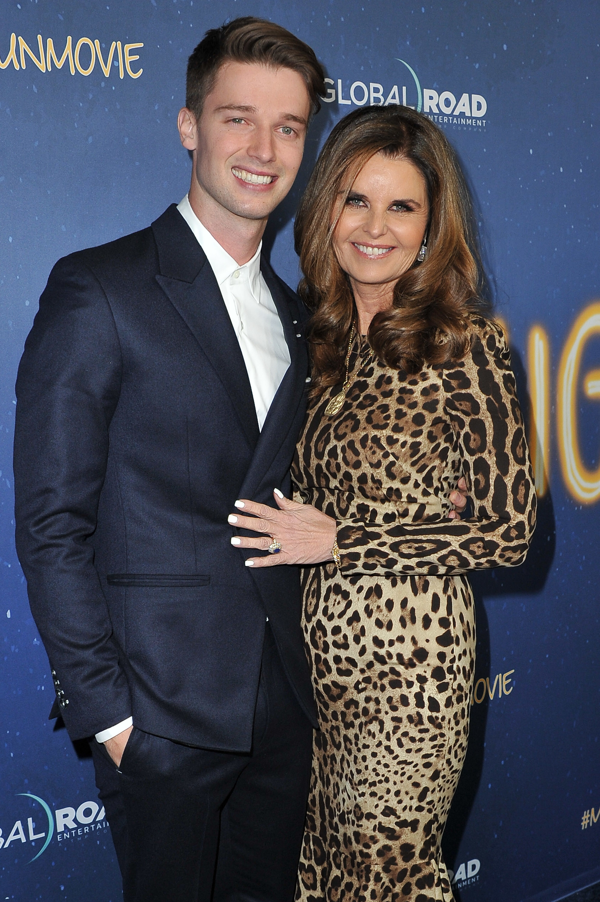 Maria Shriver and Patrick Schwarzenegger pose at the 2018 &quot;Midnight Sun&quot; premiere