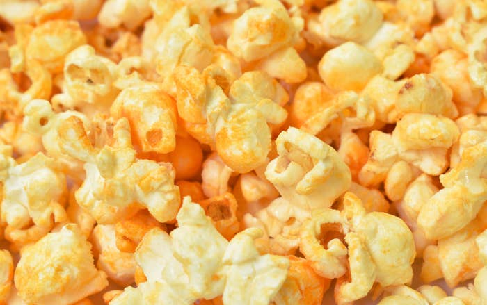 Cheesy popcorn up close.