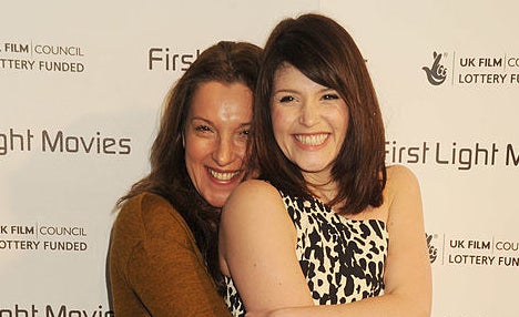 Gemma Arterton and Barbara Broccoli hugging