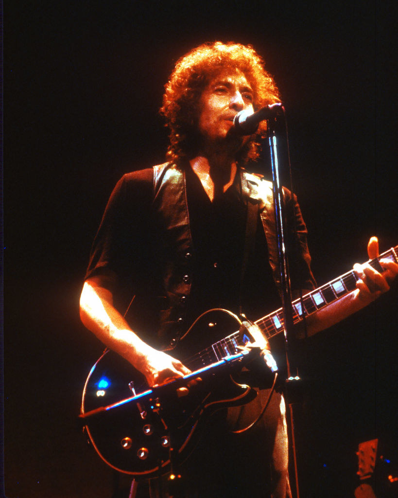 Bob Dylan performing on stage