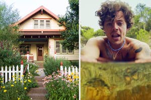 A house stands in front of bushes of flowers and a shirtless Harry Styles leans into a pond