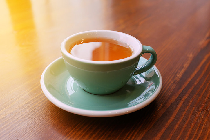 A cup of tea on a saucer