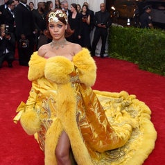 Rihanna in the dress with the train on the red carpet