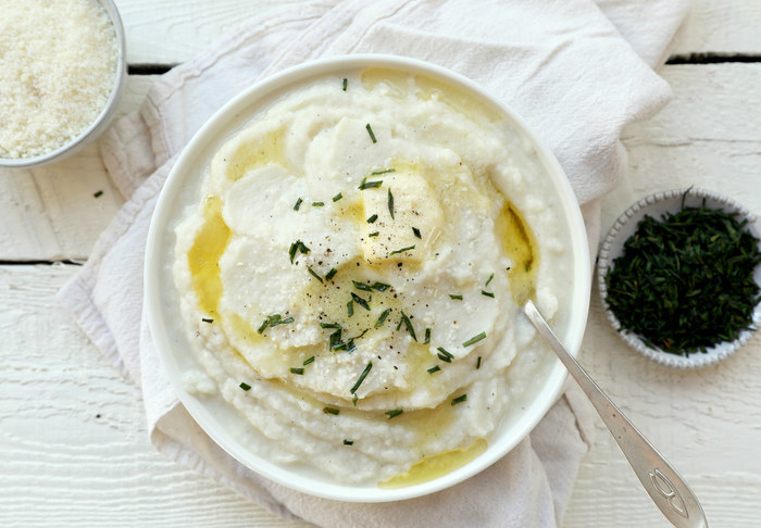 Creamy cauliflower mash topped with butter
