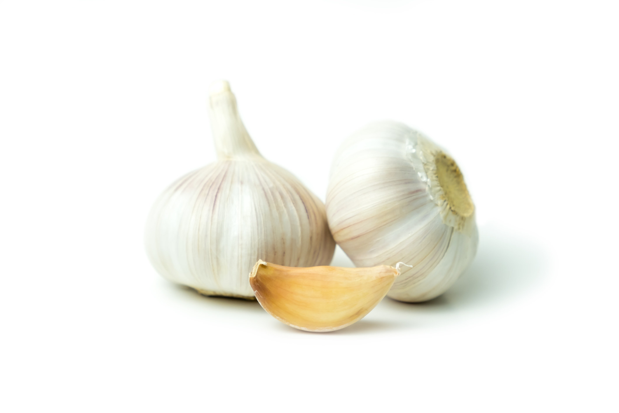 Garlic bulbs and a clove