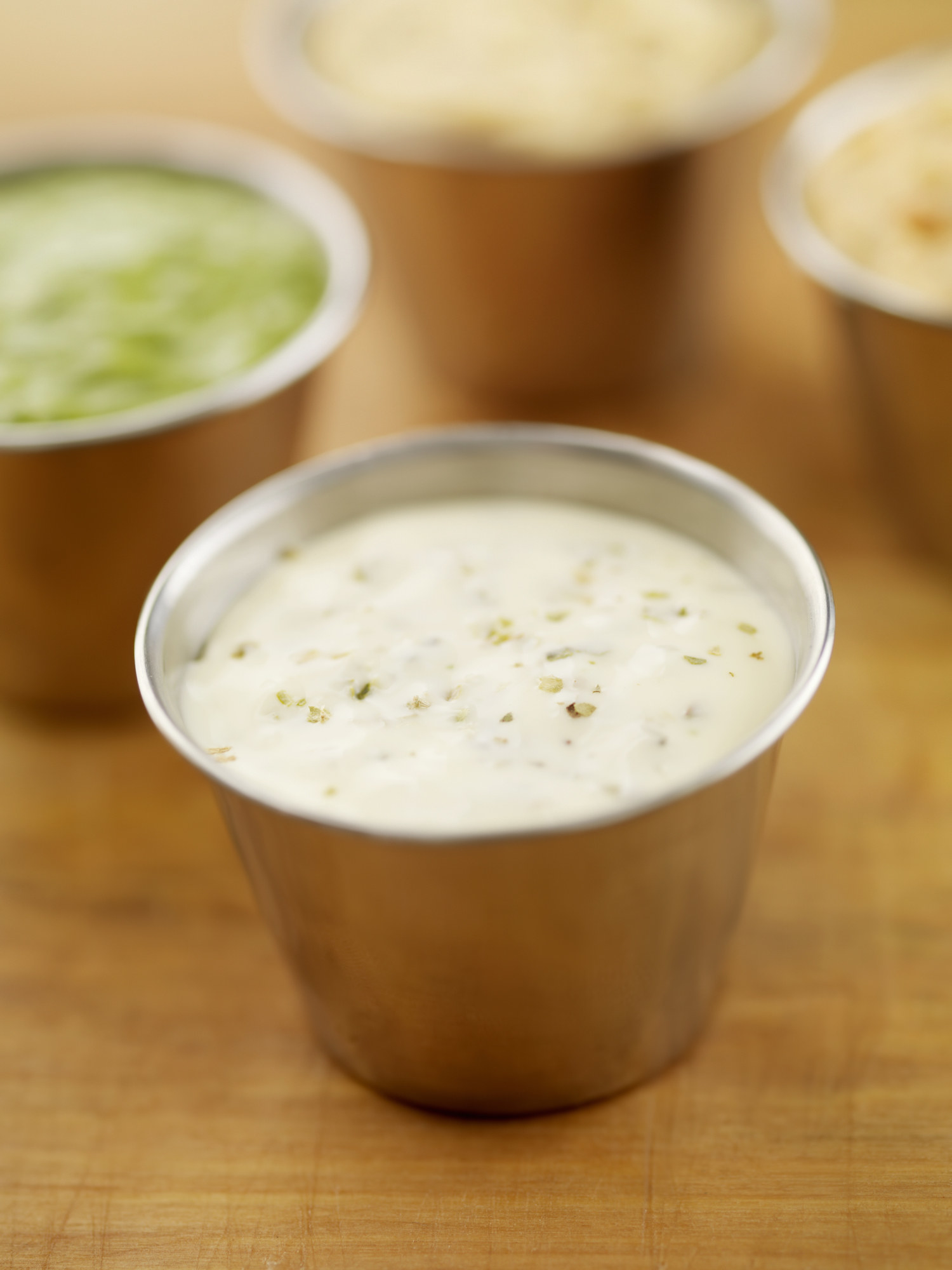Close-up of ranch dressing in a small container