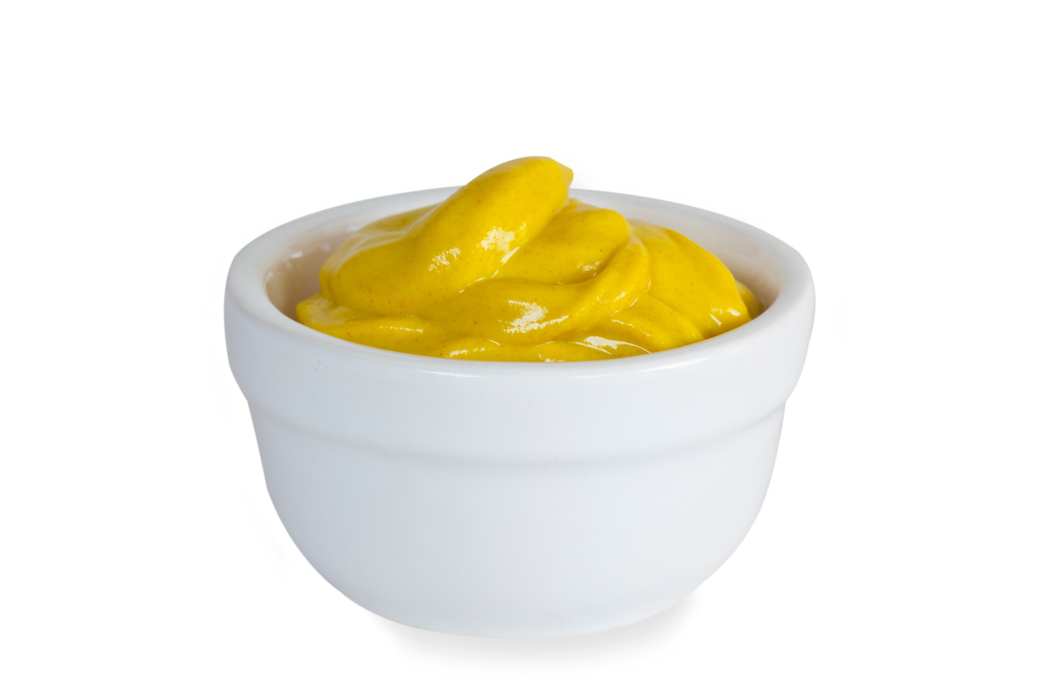 A small container of yellow mustard