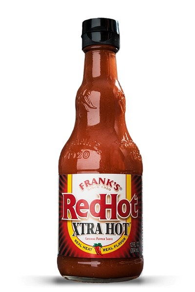 bottle of frank&#x27;s red hot sauce in extra hot flavor