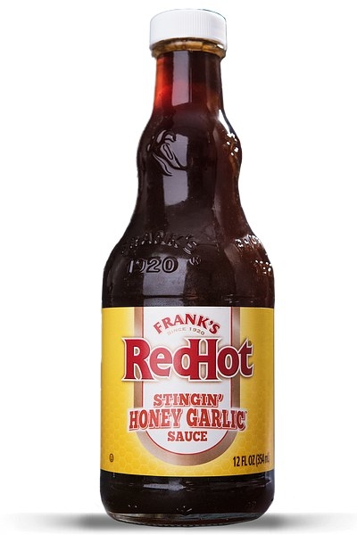 bottle of frank&#x27;s red hot sauce stingin honey garlic flavor