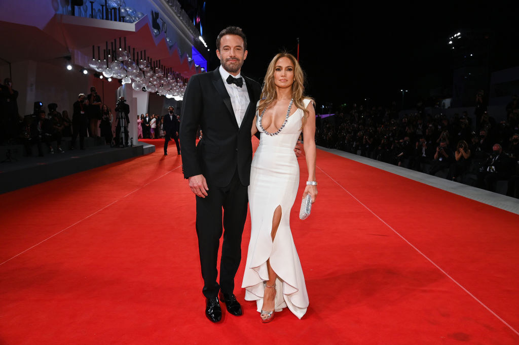 the couple pose on the red carpet