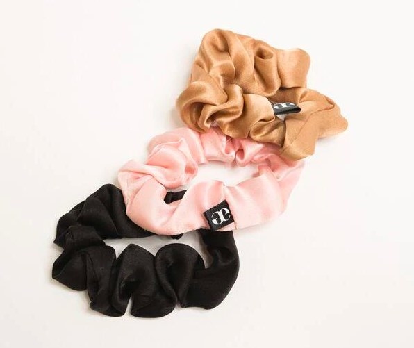 black, pink, and brown scrunchies