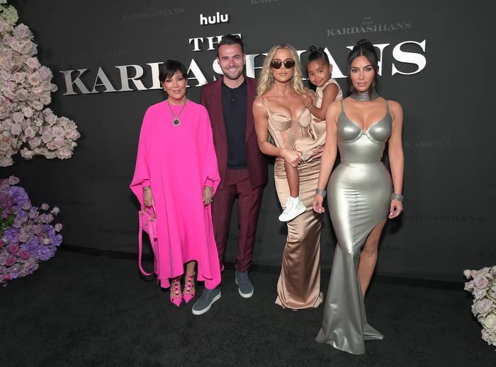 Kris, Khloe, and Kim on the red carpet posing for a photo with True