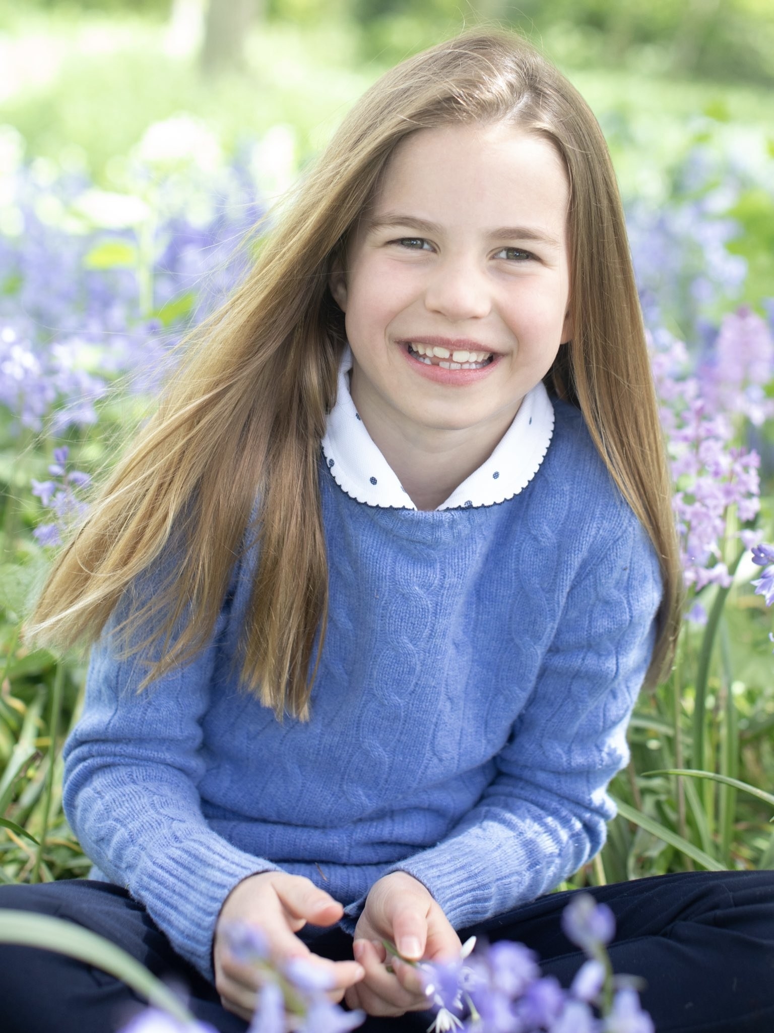 Close-up of Charlotte sitting on grass