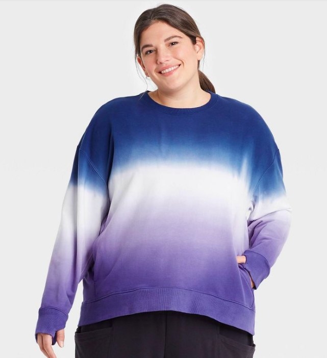 model wearing the sweatshirt in purple ombre