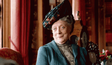 The Dowager Countess of Grantham looking pleased