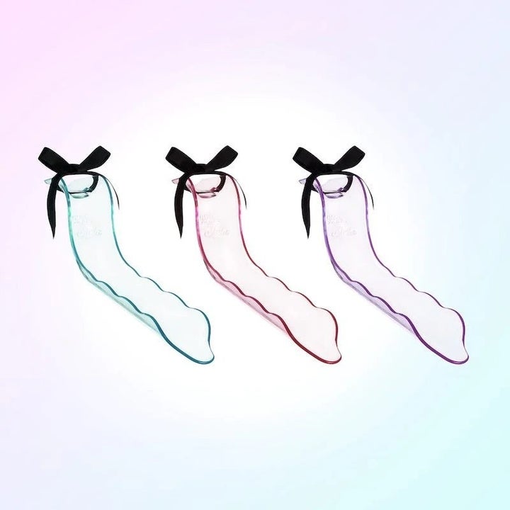 Faucet extender in blue, pink and purple