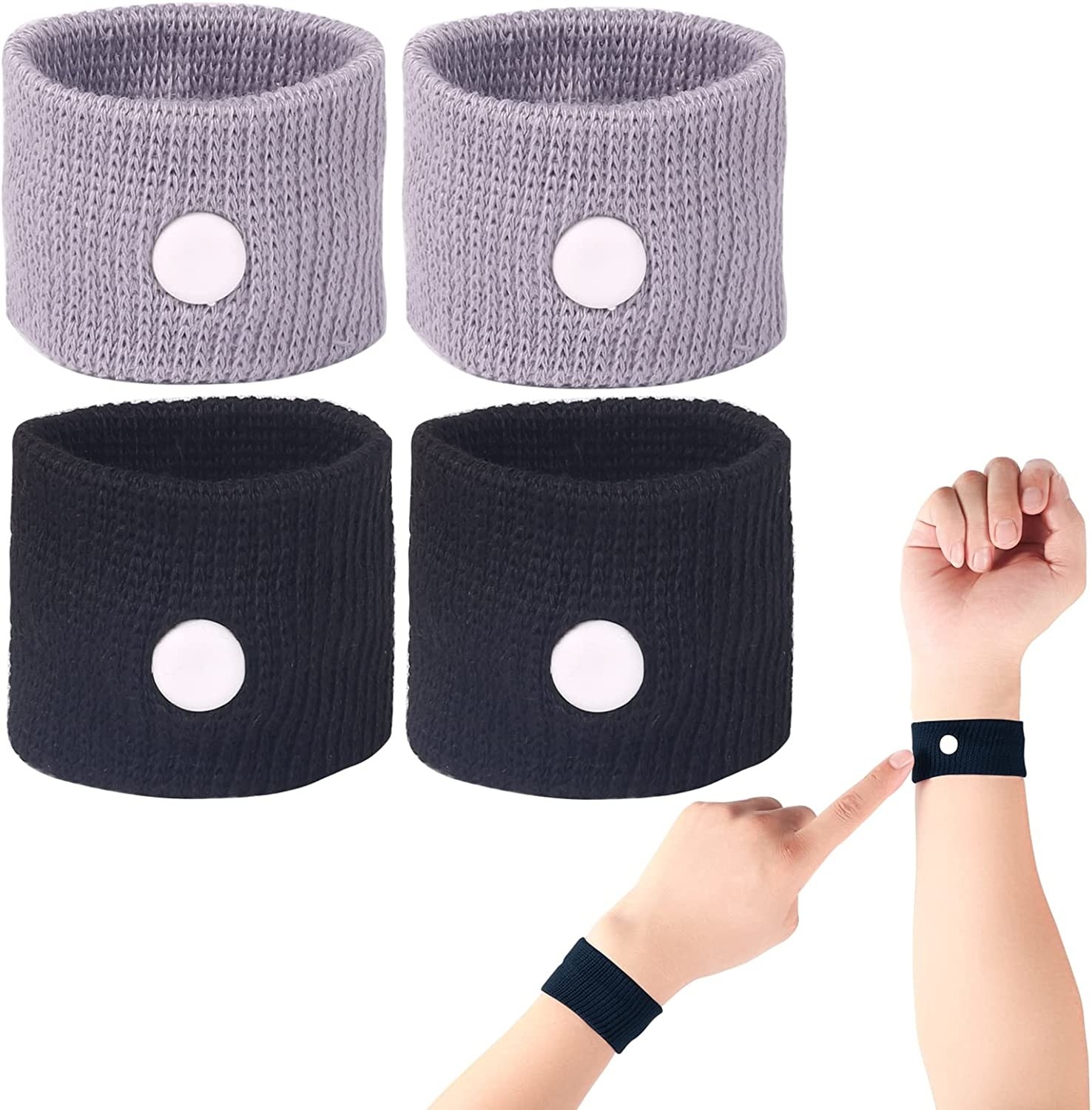 Four wristbands against a plain background with somebody&#x27;s arms wearing them on their wrist in the bottom corner