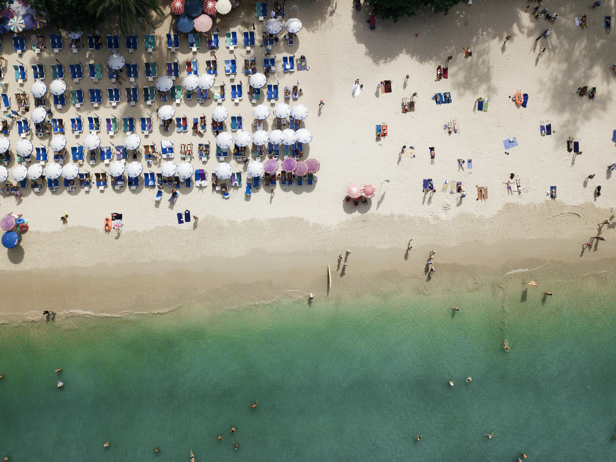 An aerial view of a crowded beach in Phuket.