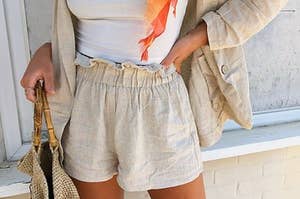 model wearing the nude linen shorts