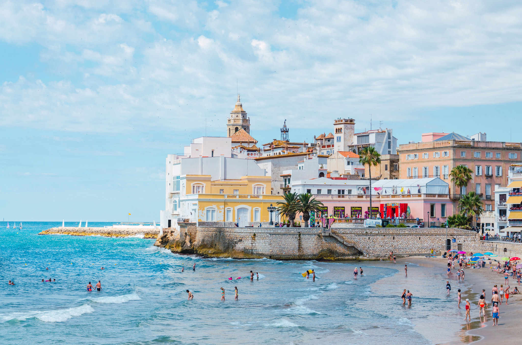 Colorful buildings overlooking the sea in Sitges, Spain.