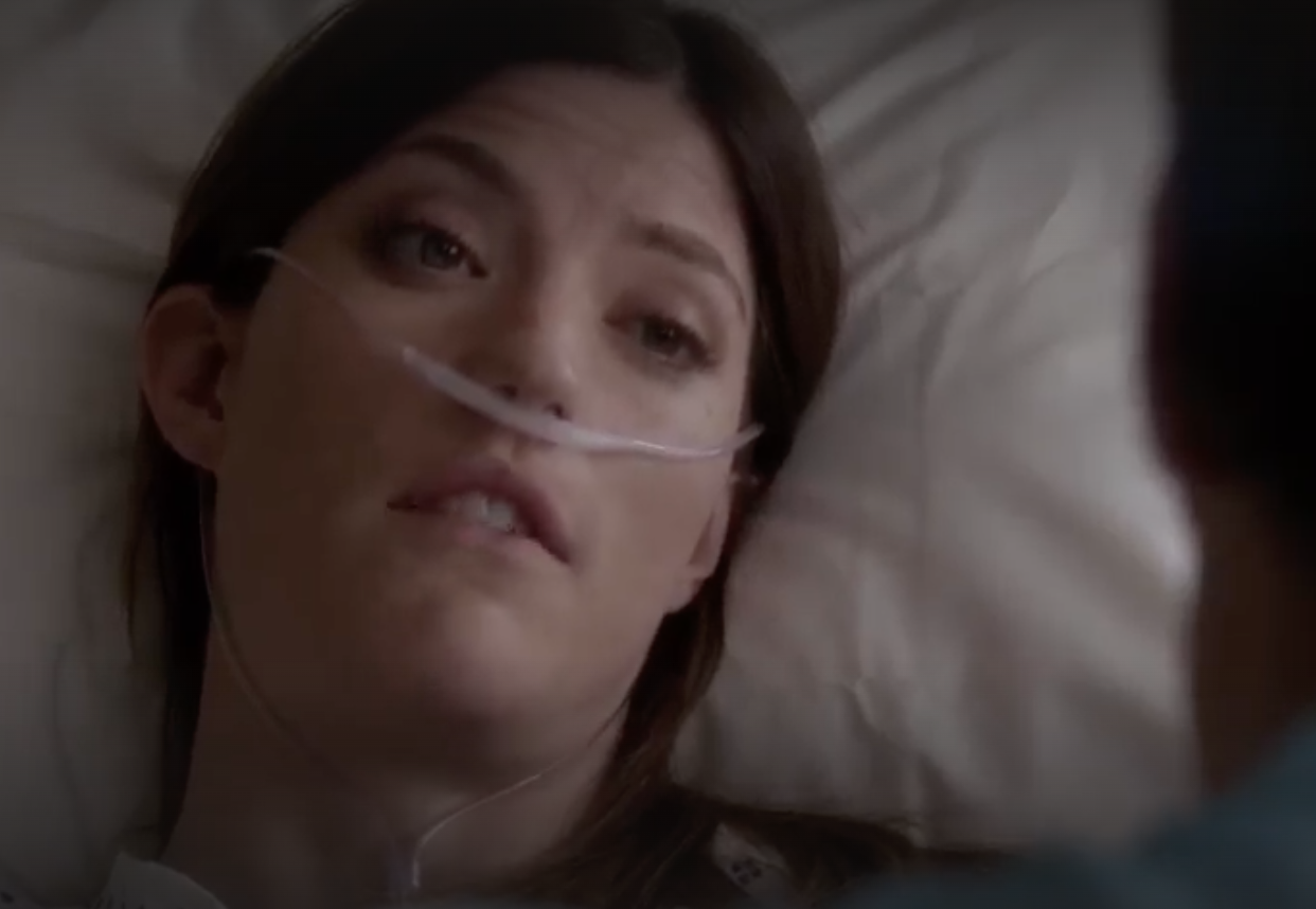 close up a character in a hospital bed with tubes in their nose