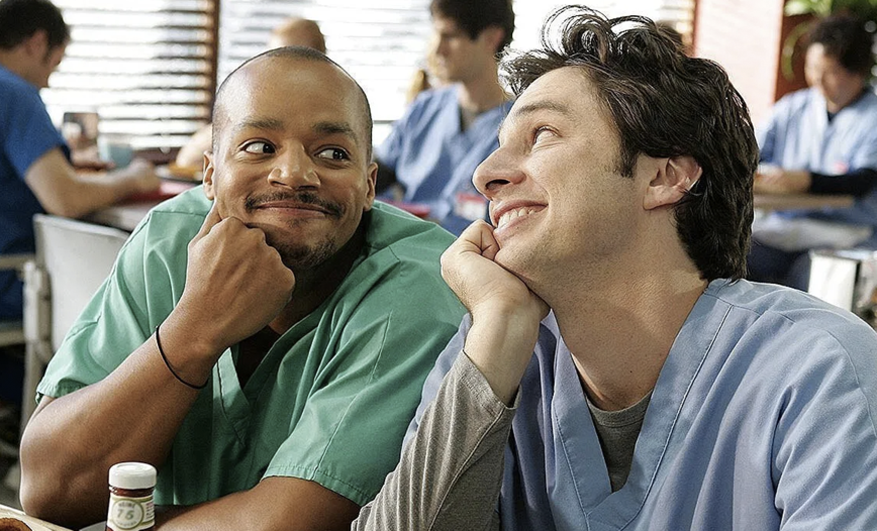 Donald Faison as Turk and Zach Braff as JD looking lovingly at each other in &quot;Scrubs&quot;