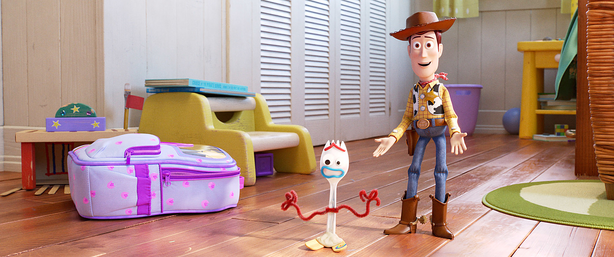 Woody and the spoon character with their arms stretched out