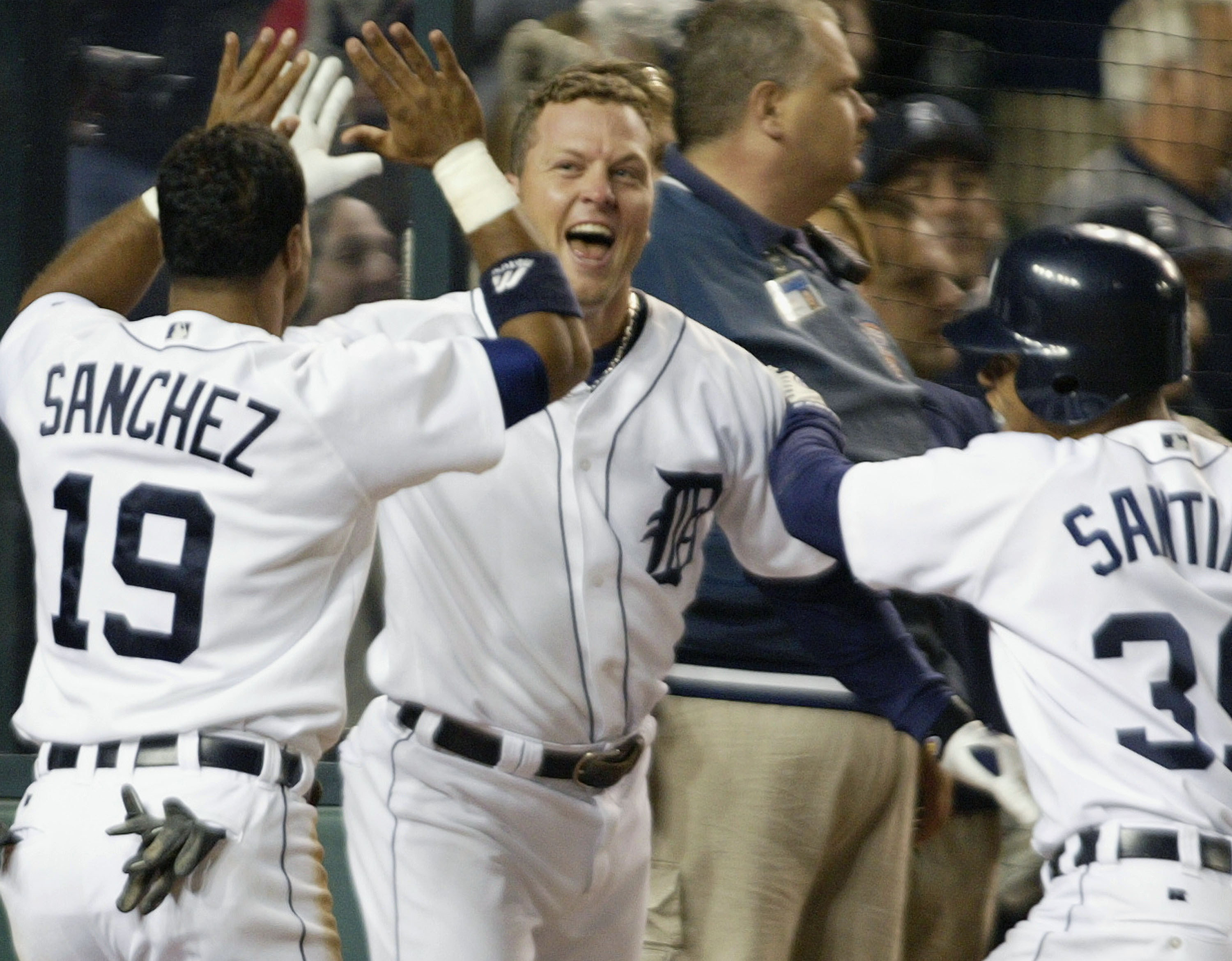 The Detroit Tigers slapping five at a game