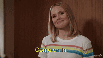 A gif of Eleanor from the Good Place saying &quot;come on in&quot;