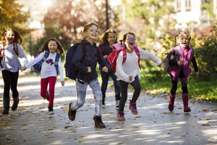 Kids running in schoolyard