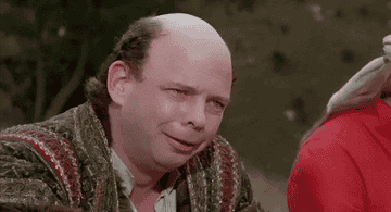 Vizzini taunts the Man in Black by waving a cup of possibly poisoned wine in front of himself