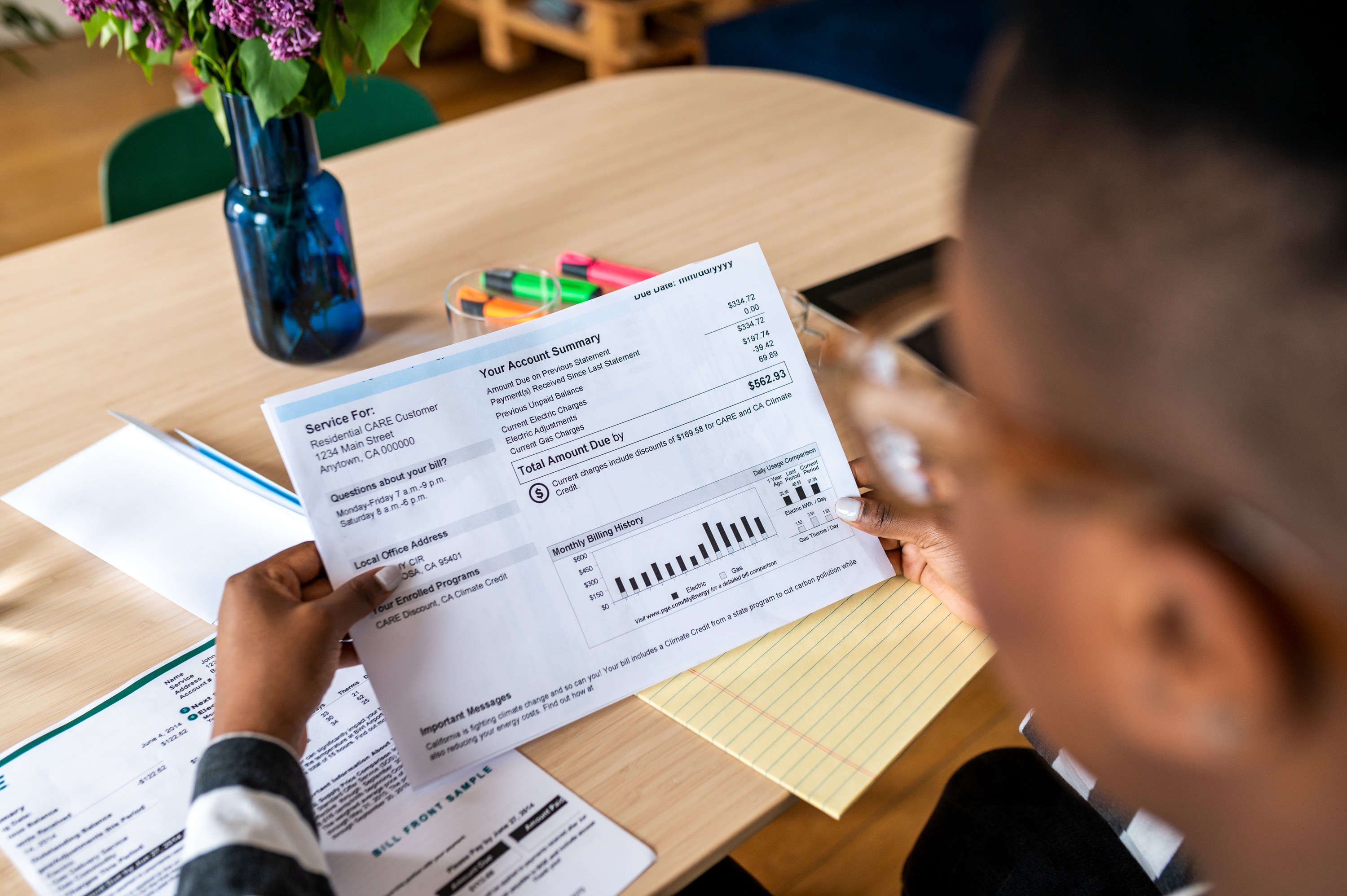 man looking at utility bill