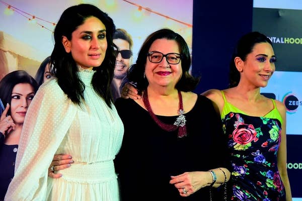 Kareena Kapoor Khan, Babita Kapoor, and Karishma Kapoor pose for a photograph. A bespectacled Babita has her hands around Kareena's waist