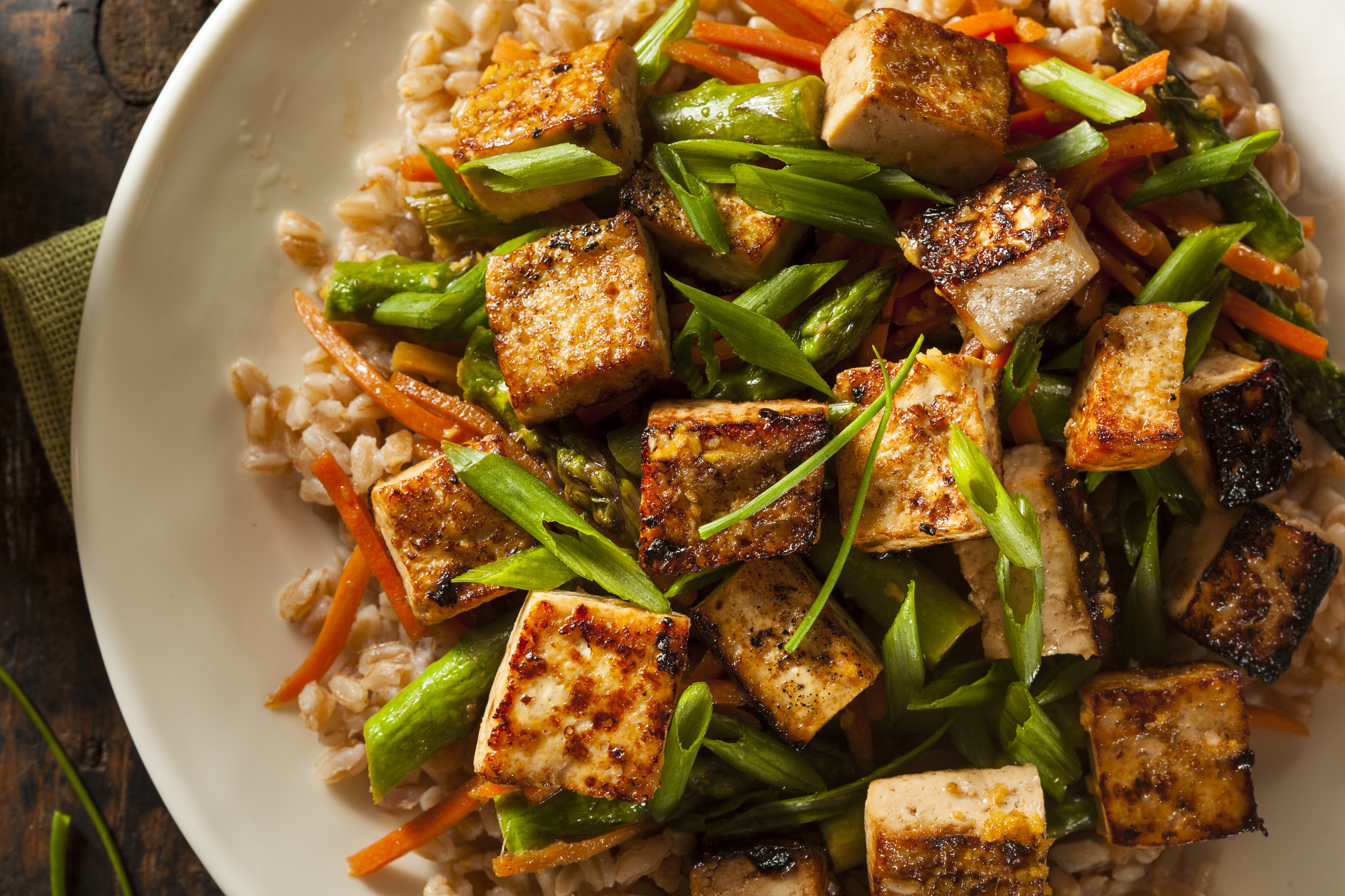 Tofu stir fry with vegetables and rice.